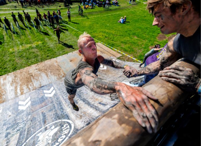 A man climbing a wall
