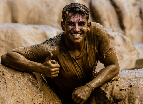 Boy completely covered in mud during the obstacle run: Removing mud from clothing, jeans, fabric shoes, and getting mud stains out of clothes